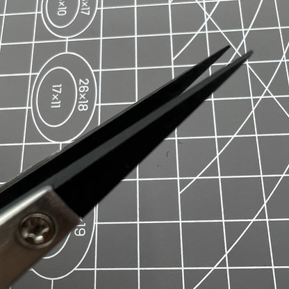 Stainless steel Carbon Fiber Head Tweezers for precise watch repair tasks.