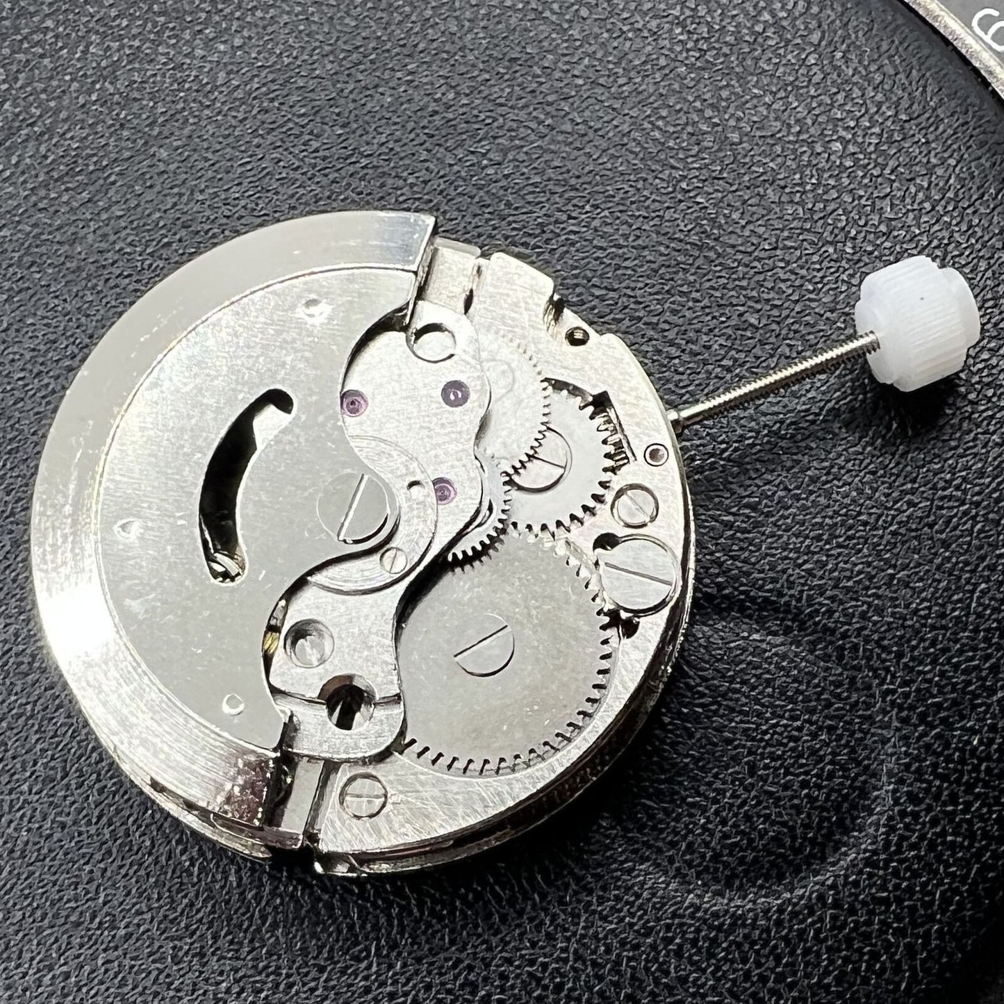 Dandong Small Second@6 watch accessory displaying intricate automatic mechanical movement with precision gears.