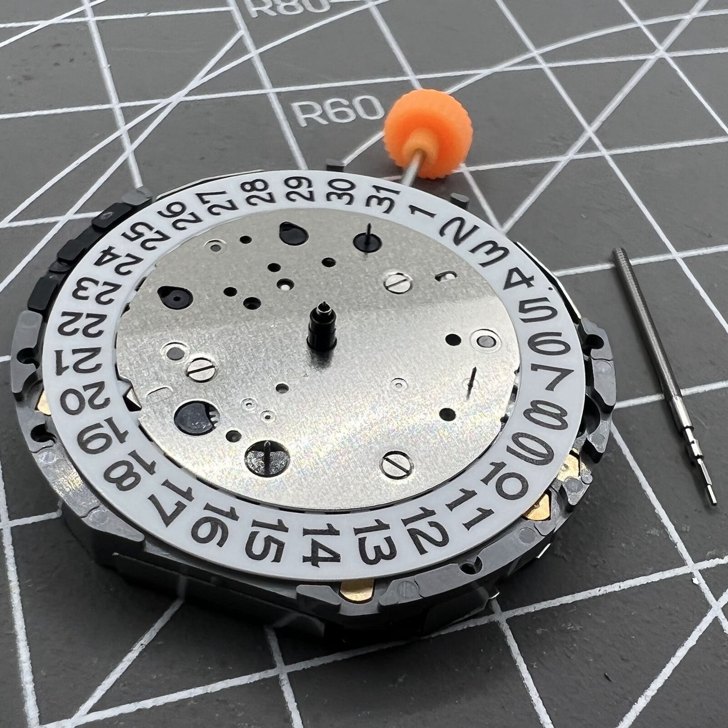 Miyota JS26 quartz movement watch with small seconds at 3, 6, 9 and date window at 3, Japan made.