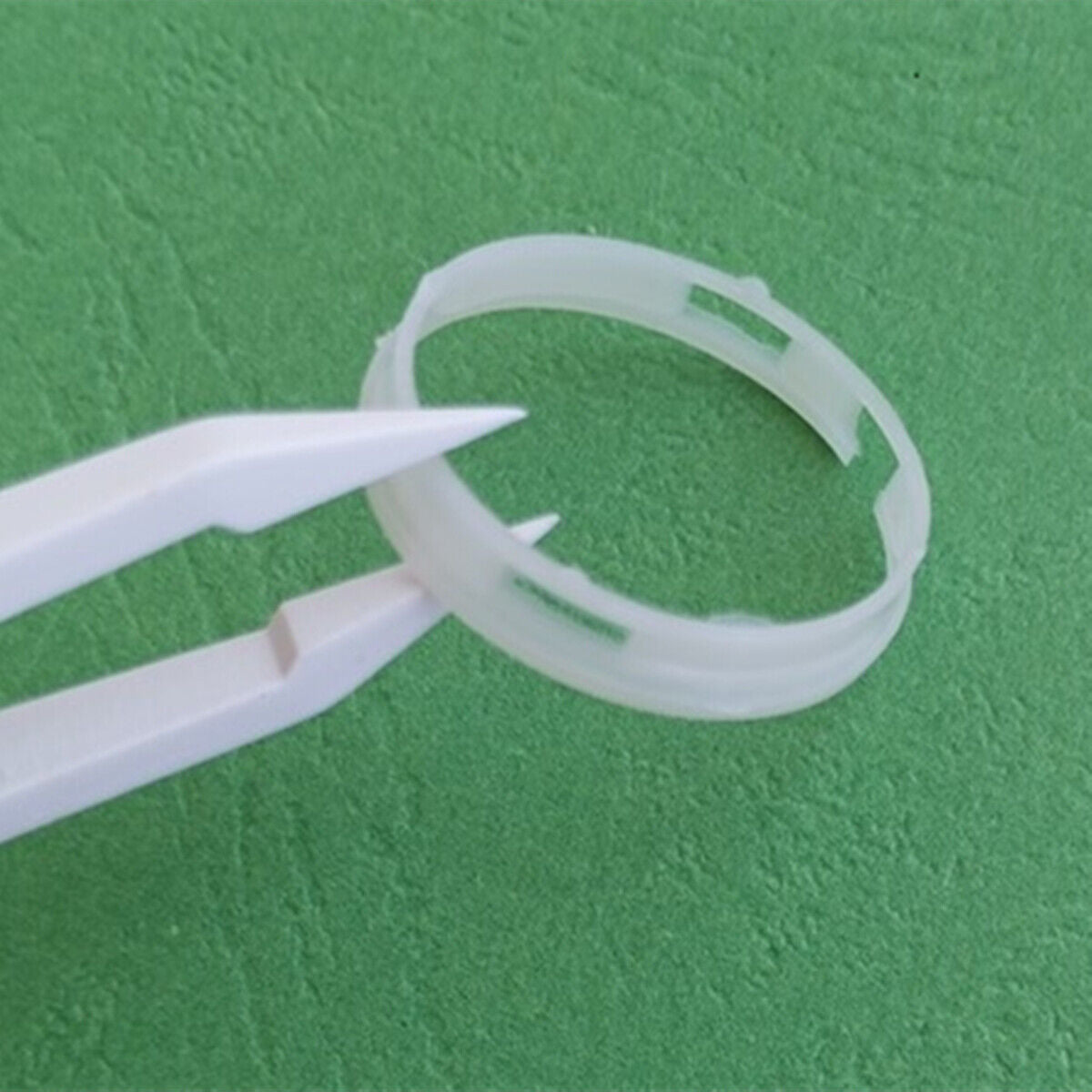 Watch case mounting spacer ring for Miyota 2005 2115 movement, precise fit for secure assembly.