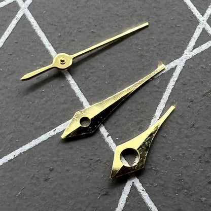 Golden 6.5mm pointed watch hands with trim for Miyota 2315 and compatible movements.