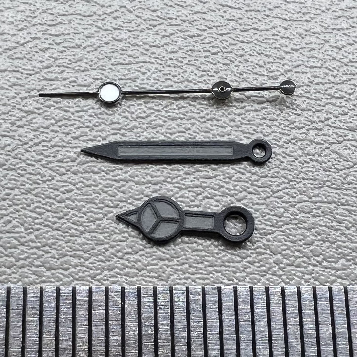 Set of 2 black second watch hands with matte trim and black painted lume for NH35/36.