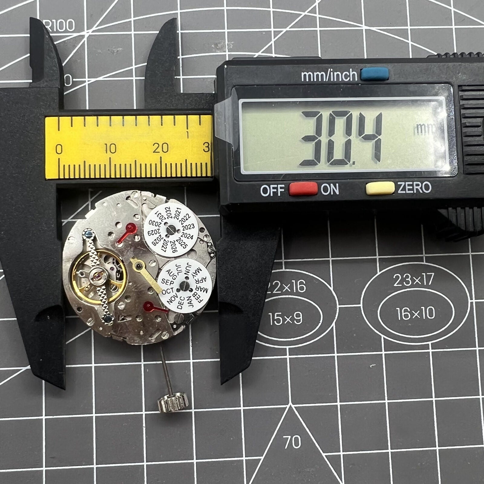 Dandong Silver Hollow Balance Wheel displaying intricate automatic mechanical movement in premium watch accessory.