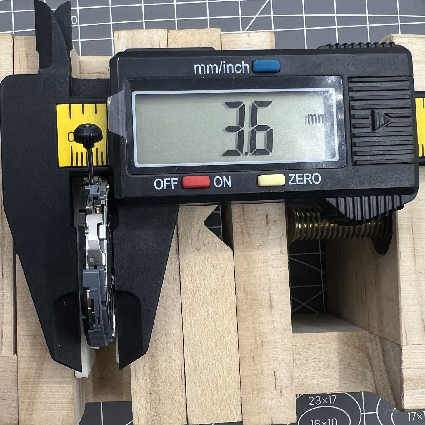 Miyota 6S20 quartz watch movement with date at 3, small seconds at 6 and 9, precision timekeeping by Miyota.