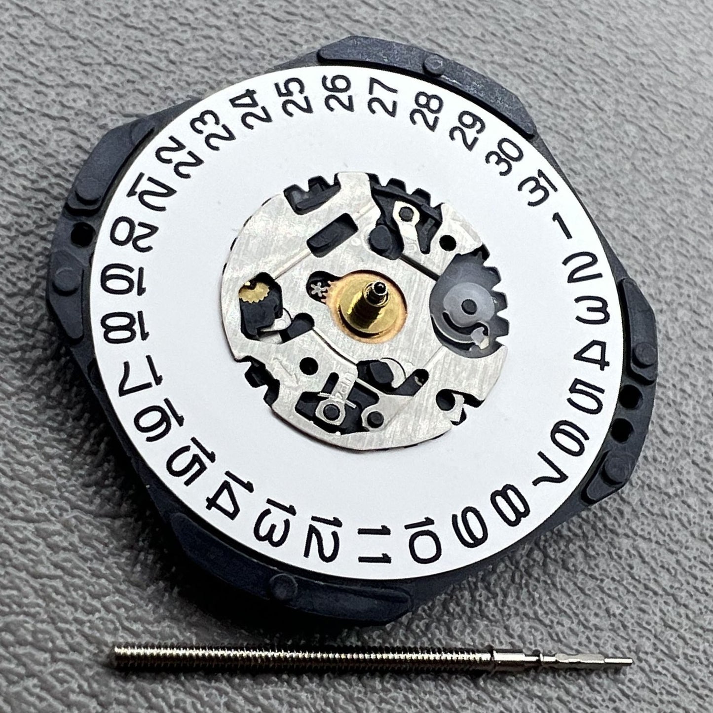 Seiko Japan 7N32C quartz watch movement with 3 hands and calendar at 3 o'clock, watch accessory.