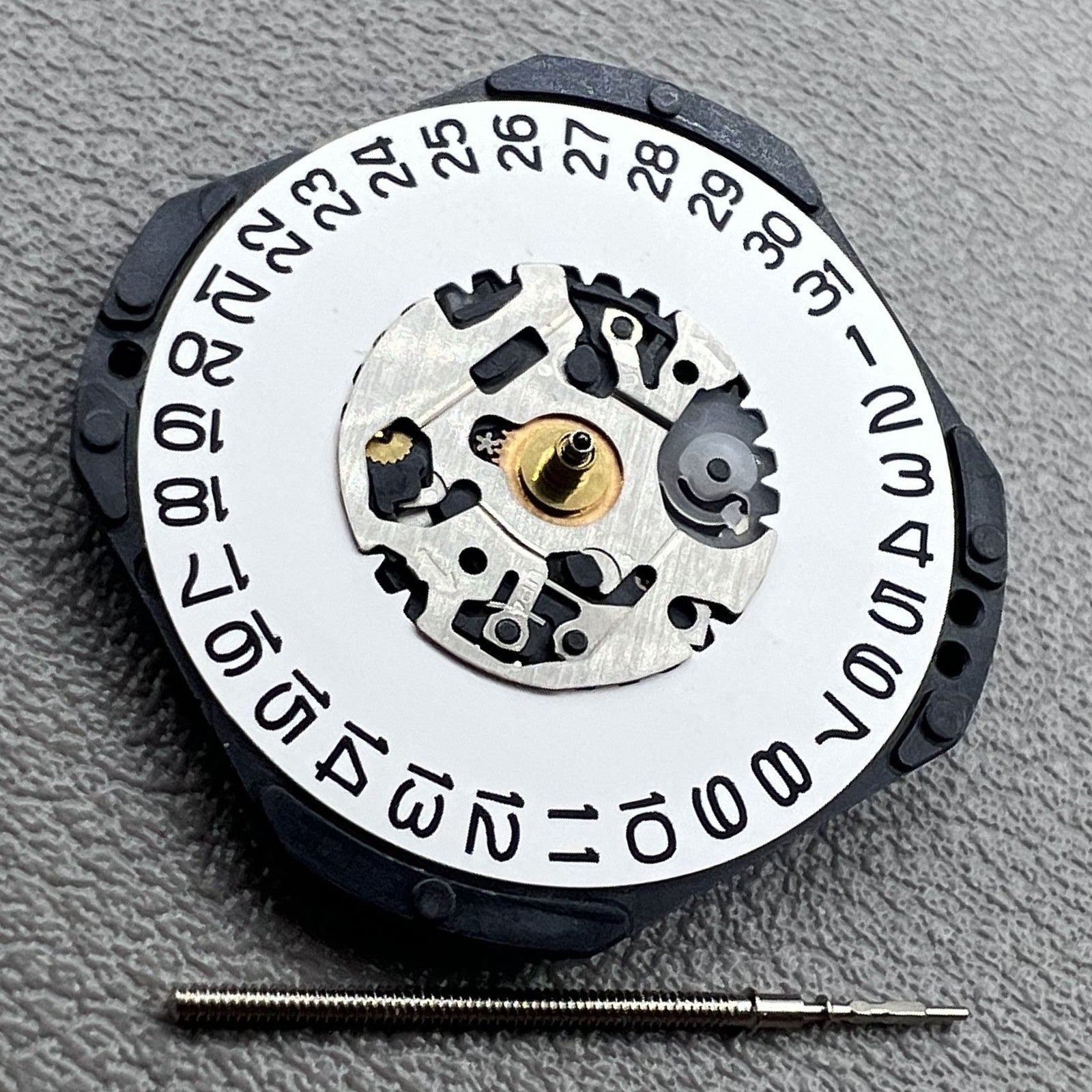 Seiko Japan 7N32C quartz watch movement with 3 hands and calendar at 3 o'clock, watch accessory.