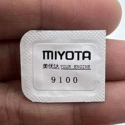 Miyota 9100 watch barrel with complete mainspring, precision spare part for watch repairs.