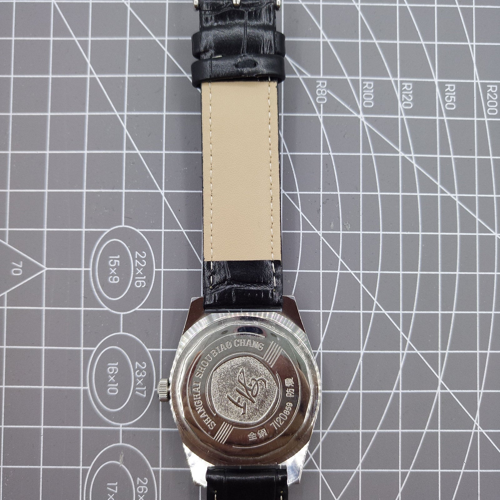 Shanghai Factory 38mm manual mechanical watch with white dial, 3 hands, 19 jewels, classic design by Shanghai Factory.