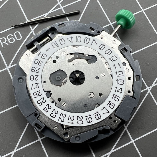 Miyota 0T45 quartz watch movement with date at 3, precision Japanese accessory part for watches.