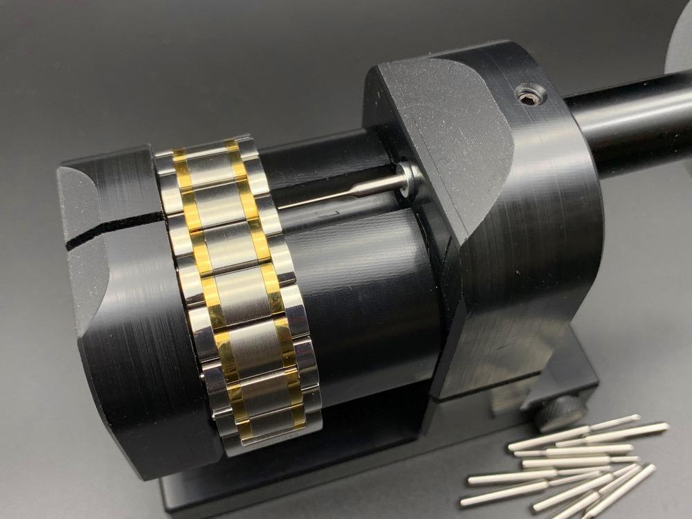 Adjustable watch strap link pin remover tool for bracelet chains for precise link adjustment.