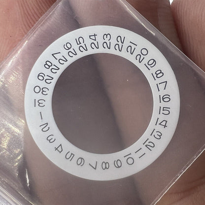 Close-up of China Made Tianjin Seagull Date Disk Wheel Overlay for 2824, 2836, 2813, 8215 watch movements