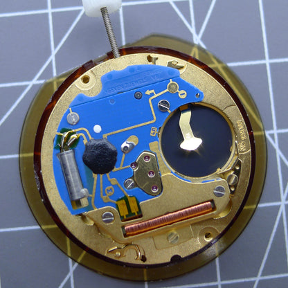 ETA 955.132 Swiss quartz watch movement displaying double calendar with week at 12 and date at 3 positions.