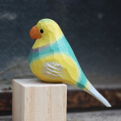 Set of 3 handmade cloud spotted parrot wooden figurines, detailed decor for home display.