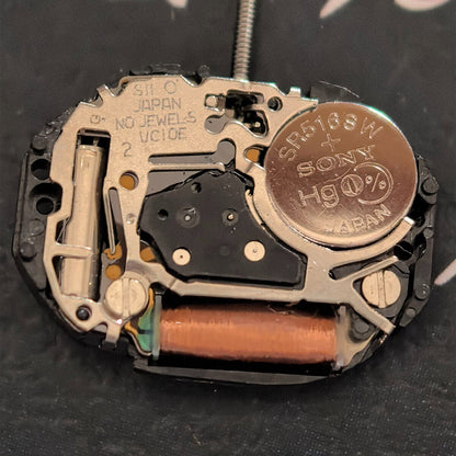 Japan Made TMI VC10E quartz watch movement with 2 hands, precise timekeeping for watch repairs.