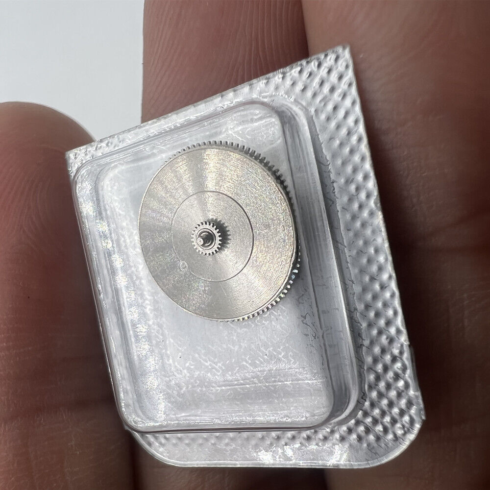 Complete mainspring barrel for Miyota 9100 watch, high-quality spare part ensuring precise timekeeping.