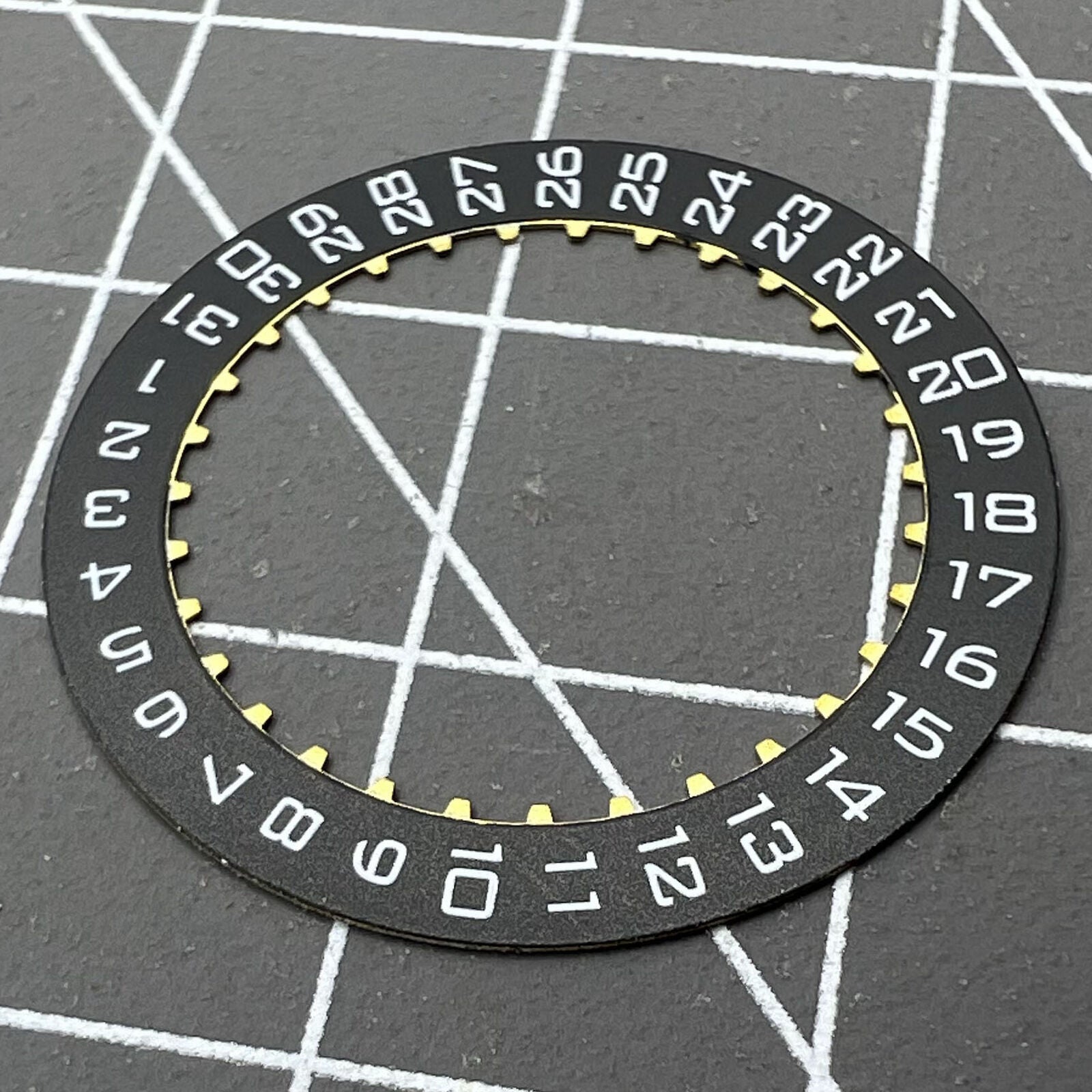 Black Date Disk Wheel displaying date at 3 o'clock for ETA2824 movements, Swiss Made precision components.