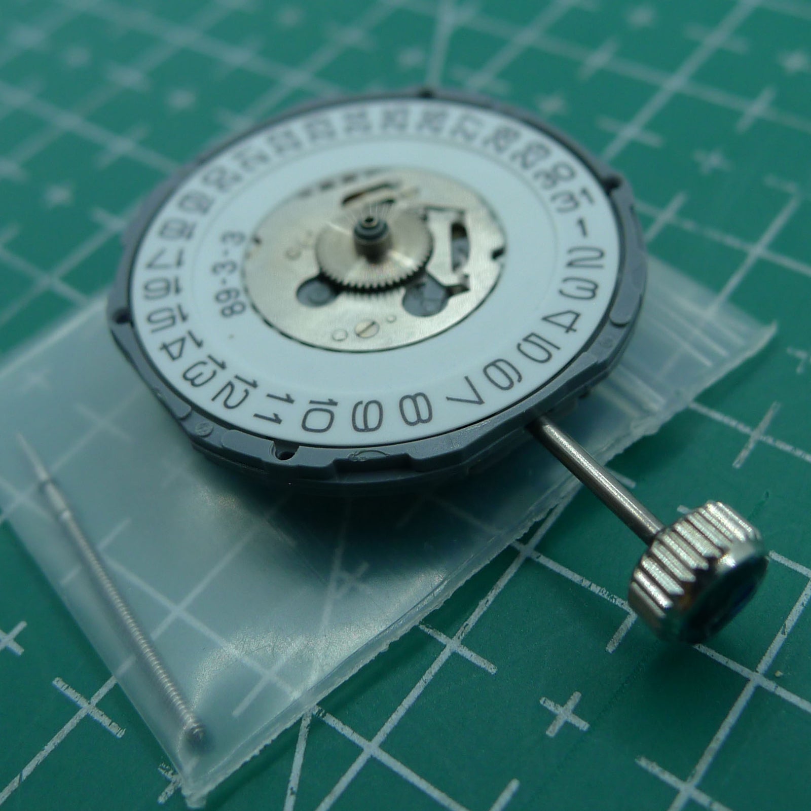 Miyota 6M17 quartz watch movement with 3 hands, Japan-made, ideal for precise watch repairs and replacements.