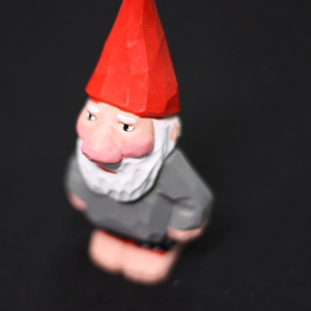 Handmade wooden garden elf figurine, charming watch accessory for outdoor d�cor.