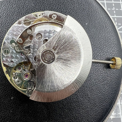 Multifunctional automatic watch with 8 hands, Dandong 7751 movement, precision timekeeping.