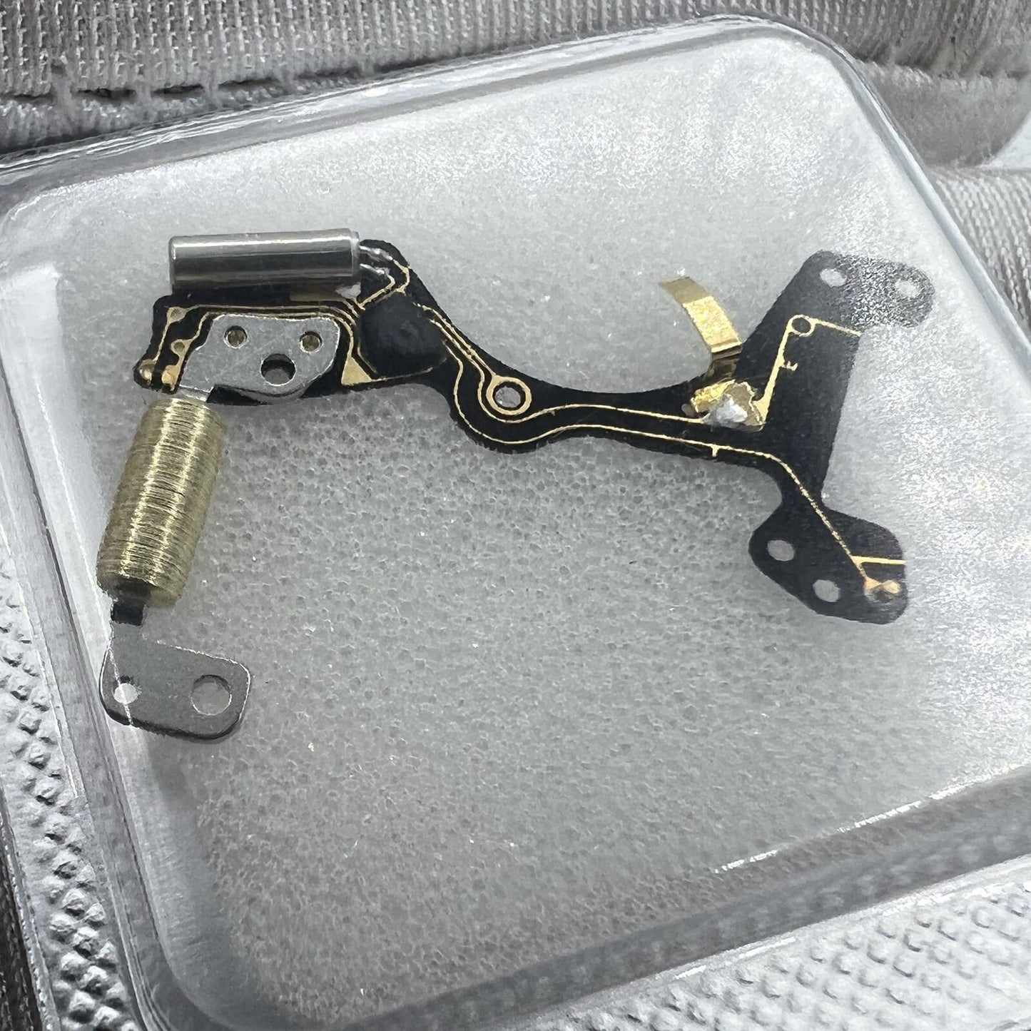 Brand new Ronda 7004.N circuit board, precise replacement for watch movement repairs.