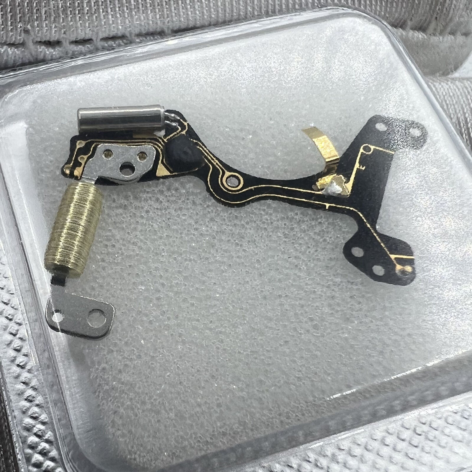 Brand new Ronda 7004.N circuit board, precise replacement for watch movement repairs.