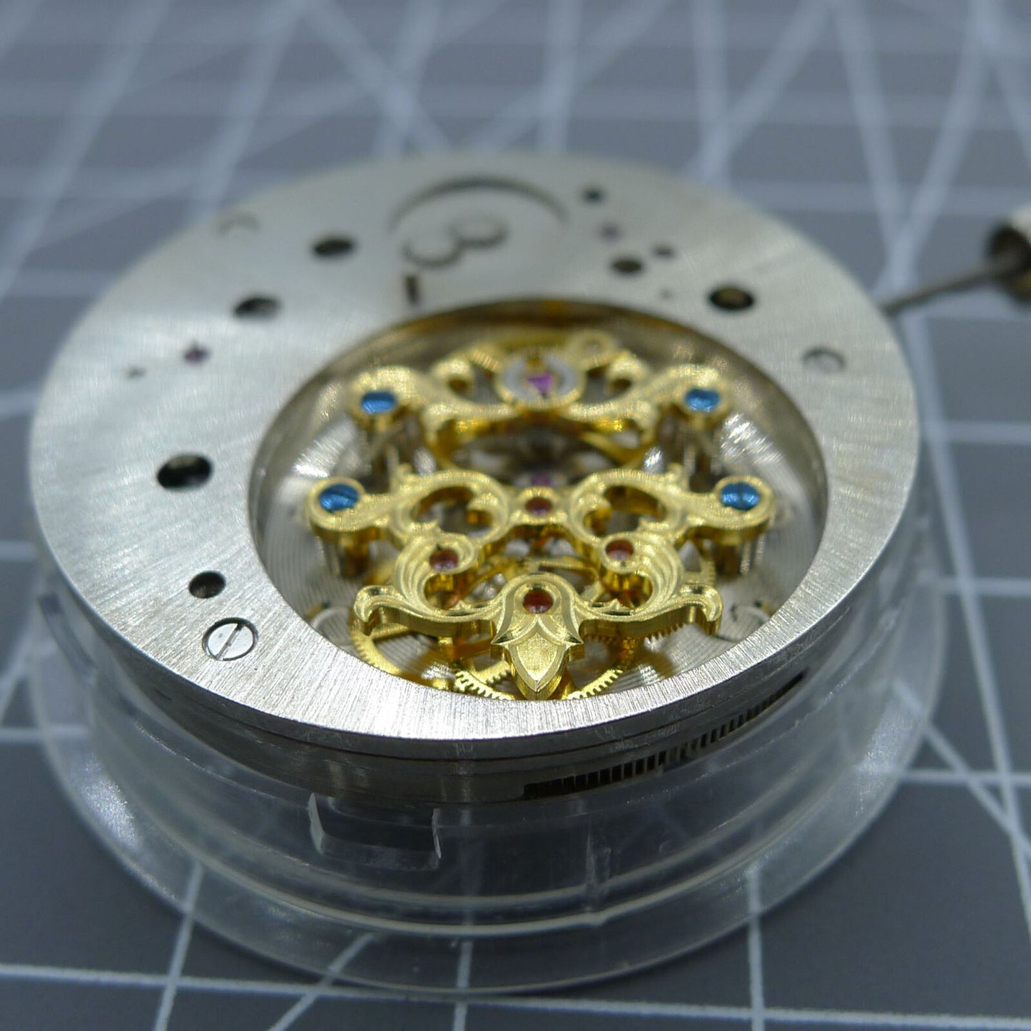 Multifunctional automatic watch, kinetic tourbillon luxury timepiece with mechanical movement details.