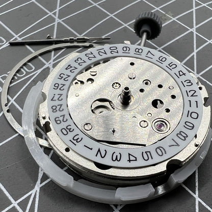 Miyota 8217 automatic watch movement showing 3 hands with small second at 9 o'clock position.