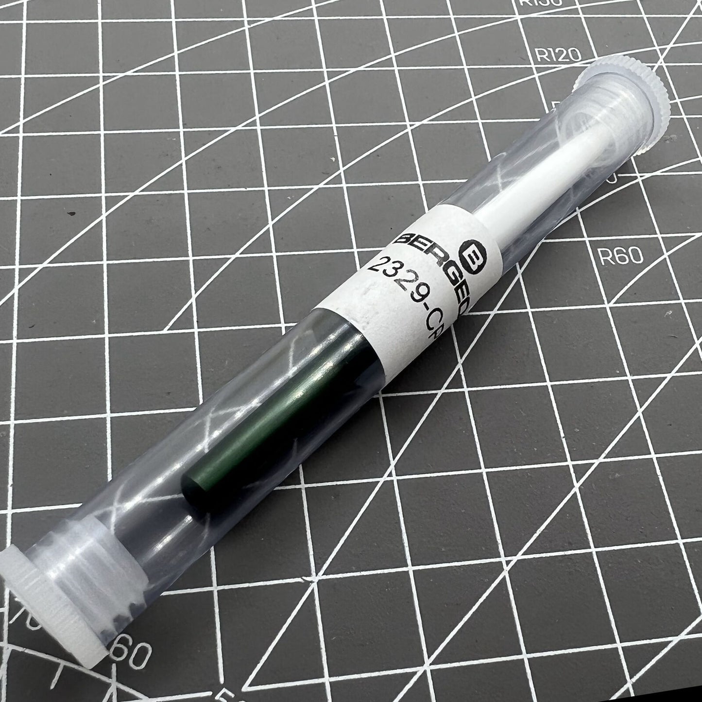 Bergeon 2329-CP watch oiler tool with stand for precise lubrication during watch repairs and maintenance.