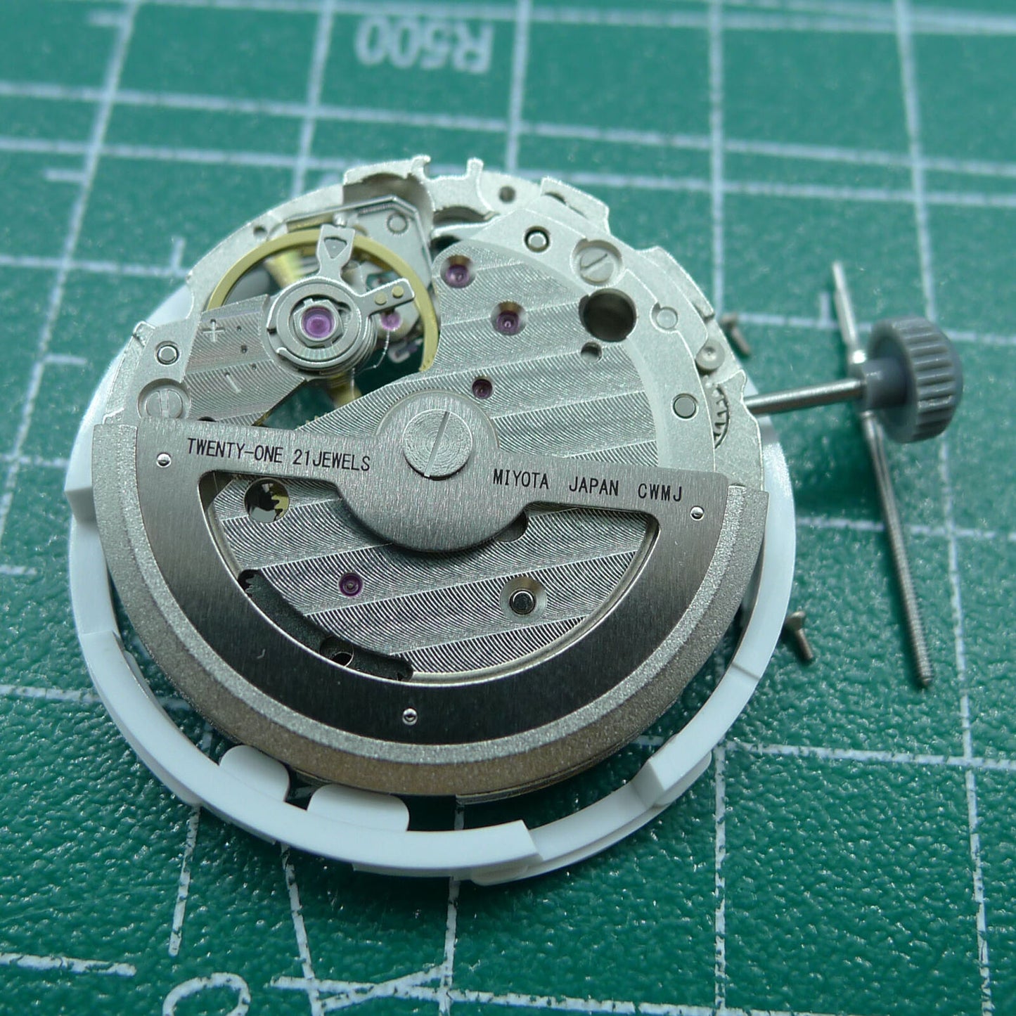 Miyota 82S0 silver plated hollow automatic mechanical watch movement by Japan for precise timekeeping.