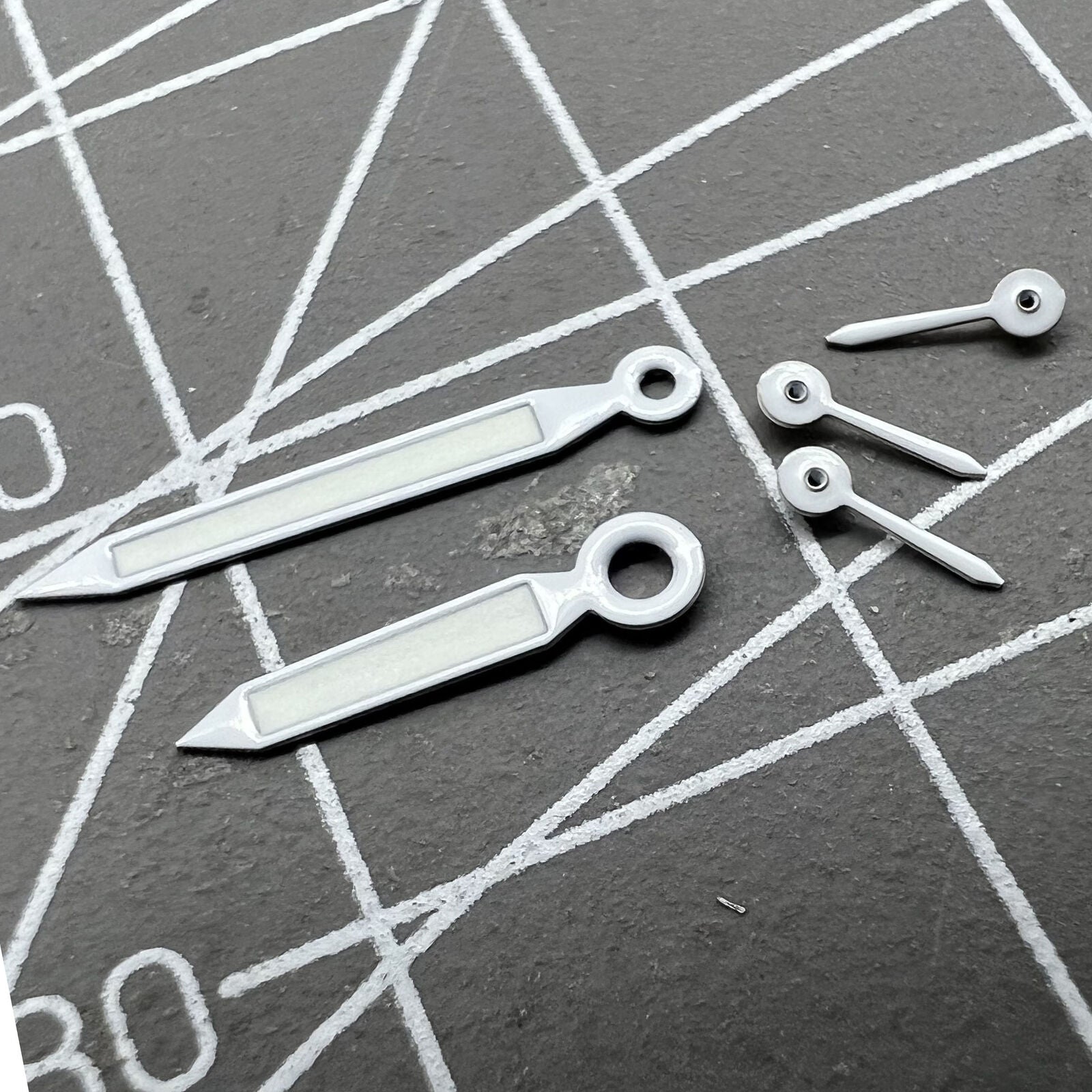 White trim green lume watch hands for Miyota OS20 movement, enhancing legibility and style.