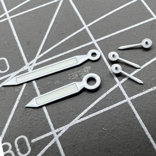 White trim green lume watch hands for Miyota OS20 movement, enhancing legibility and style.