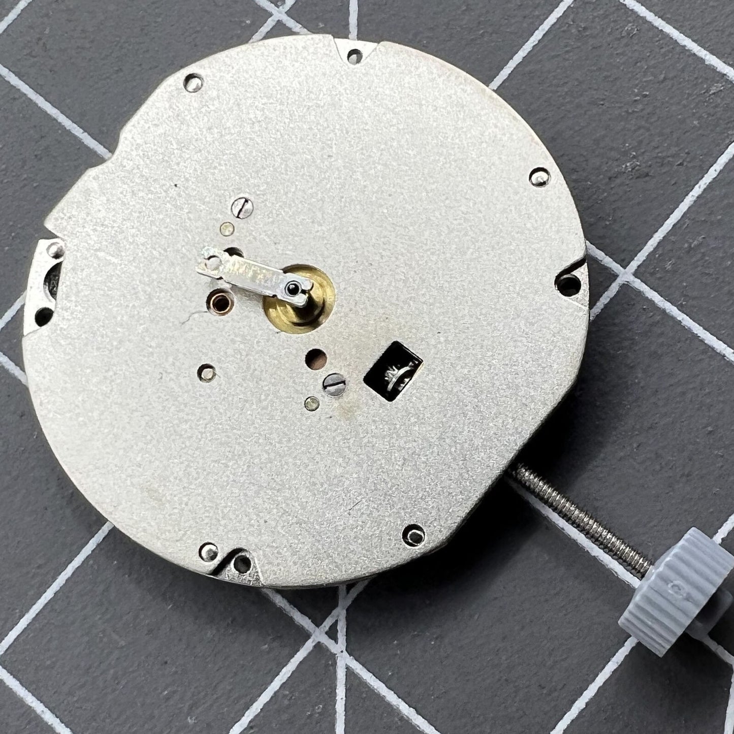 Swiss Ronda 703 quartz watch movement with precise timekeeping, ideal for watch accessories.
