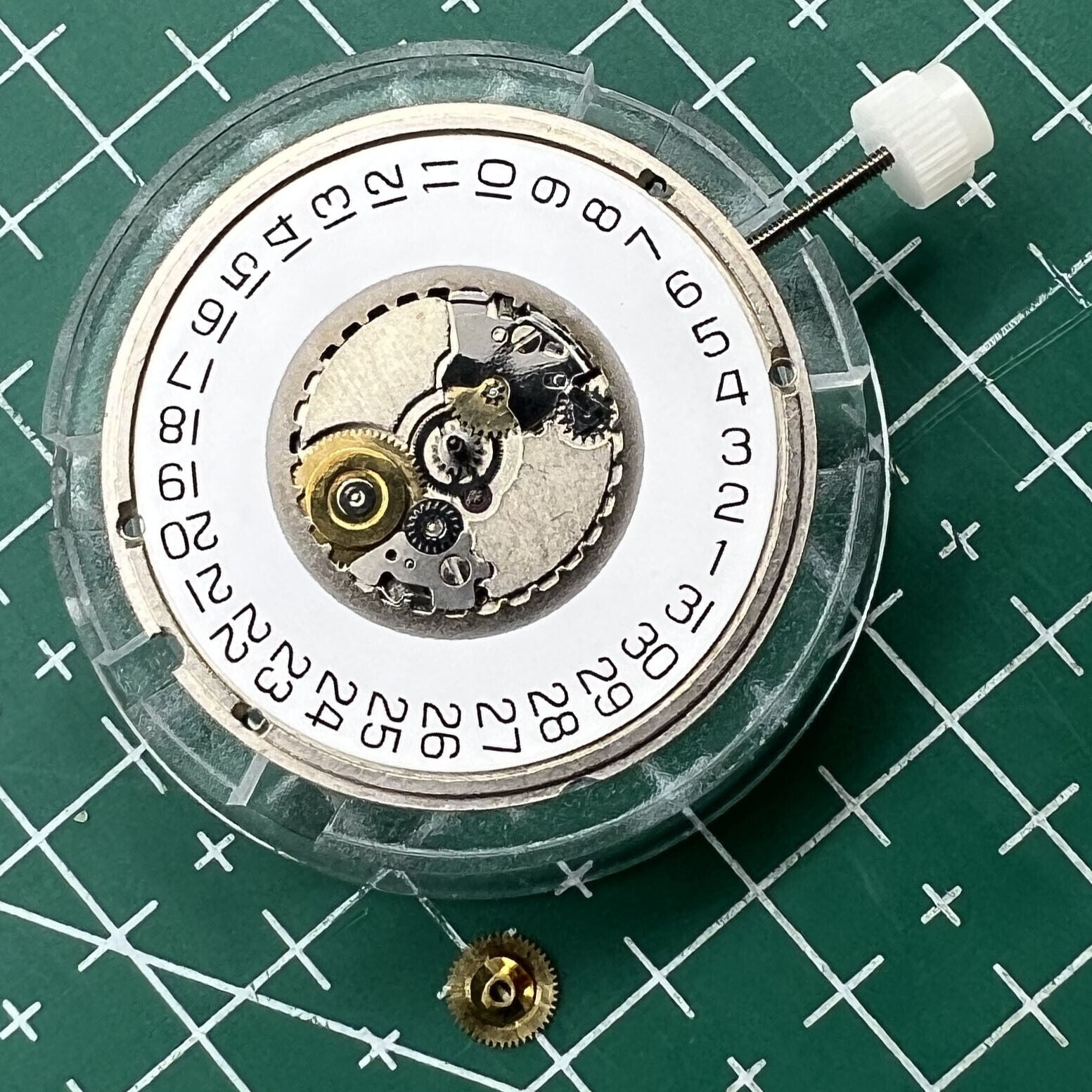 Swiss Made ETA955.114 quartz watch movement with single calendar at 3 o'clock, ideal for repairs and replacements.