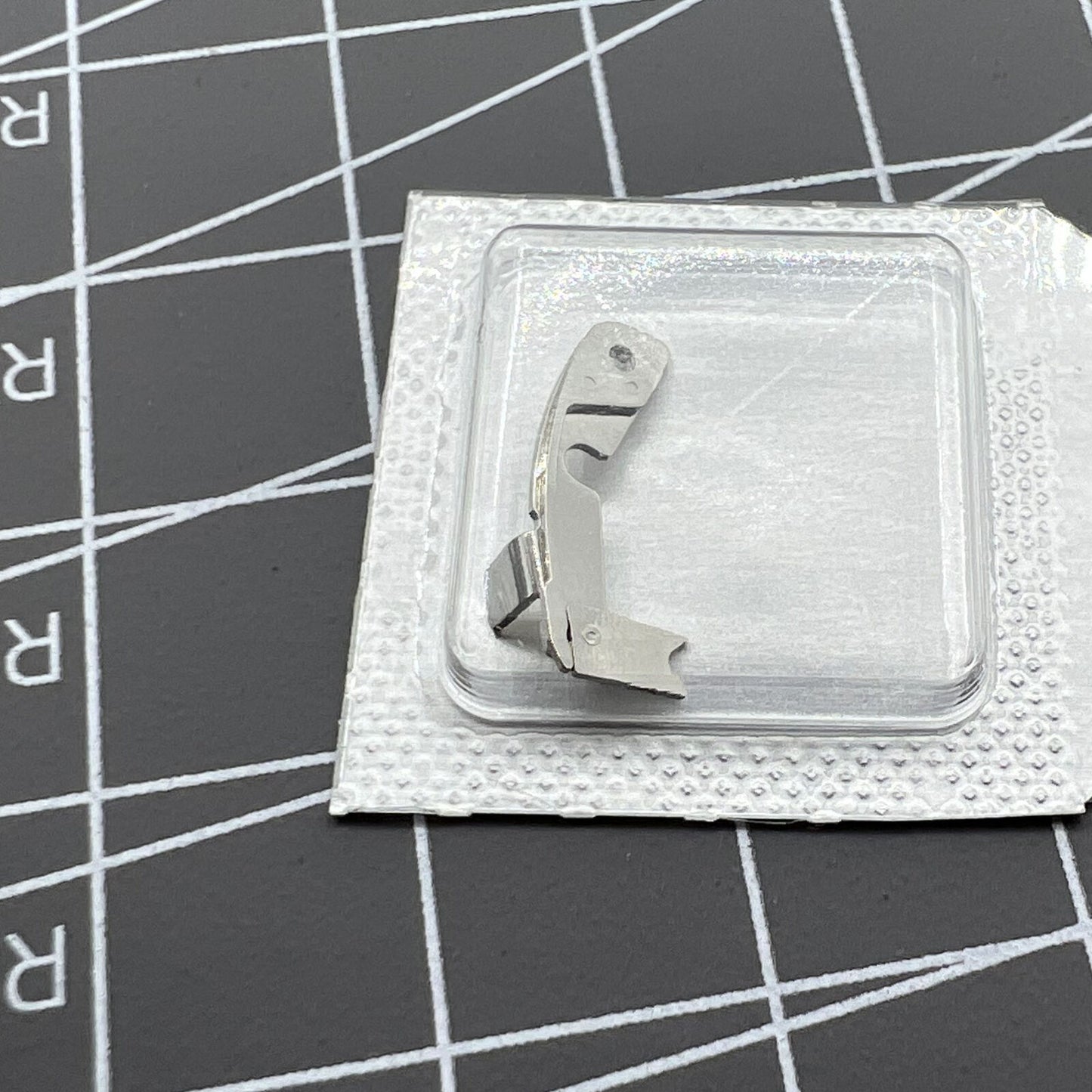 Ref.8139 operating lever for ETA 7750 watch, precise spare part enhancing chronograph functions.