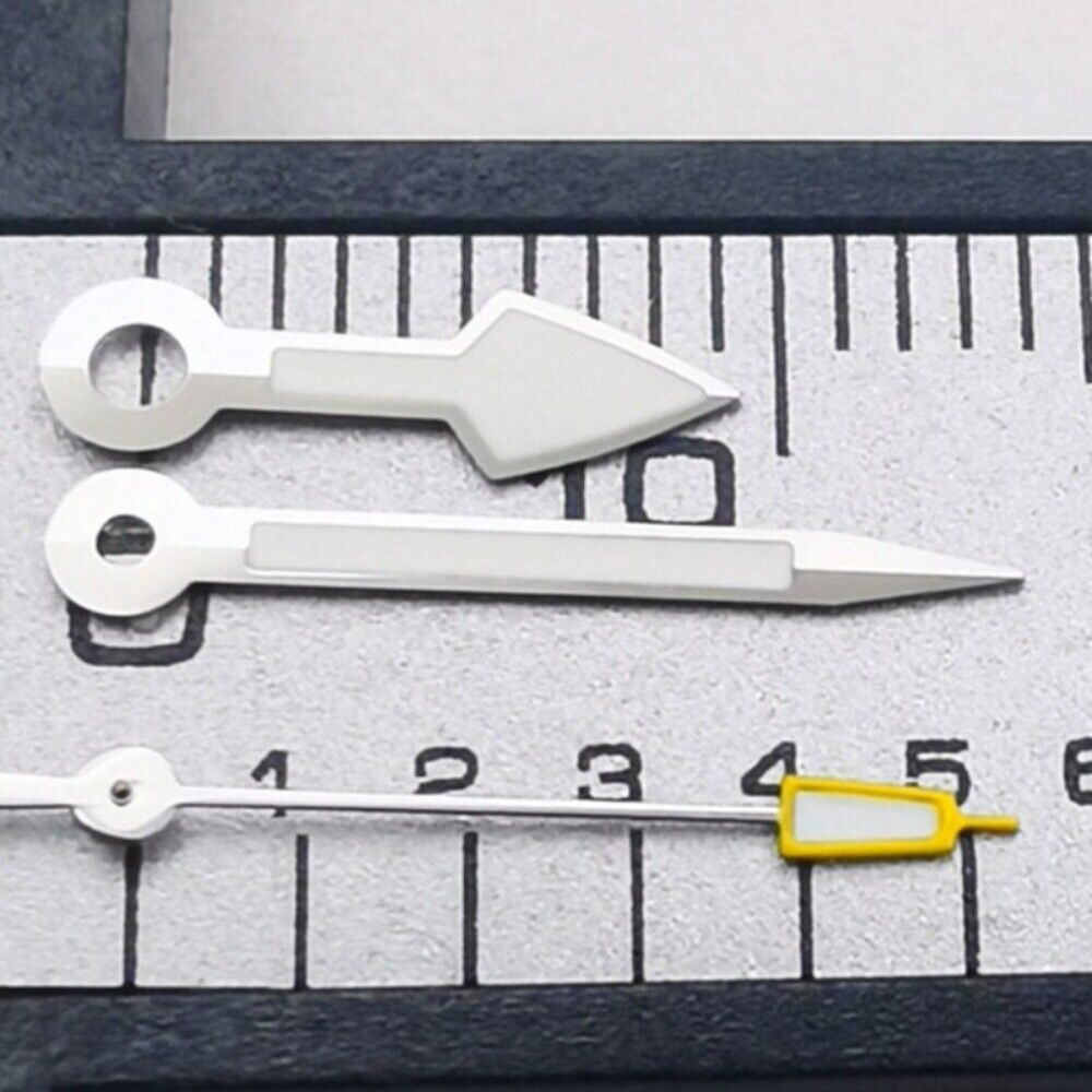 Arrow-shaped silver trim watch hands with yellow second hand and green lume, compatible with NH35 NH36 movements.