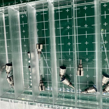 Silver stainless steel watch accessory with classical pusher drive, enhancing elegant timekeeping.