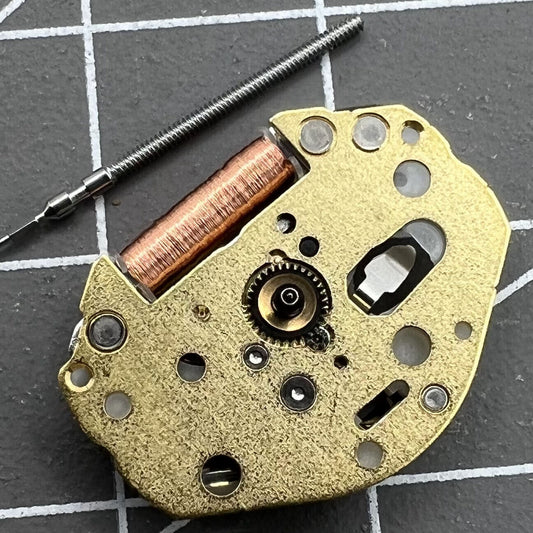 Close-up of Japan Made Miyota SUPER 2035 quartz watch movement showcasing precision engineering.