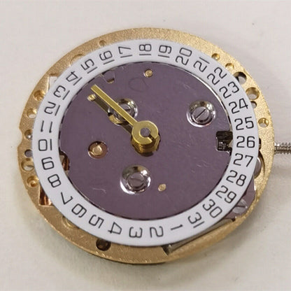 Golden ISA 222 quartz watch movement with 2 hands and calendar, ideal for lady?s watch repair.