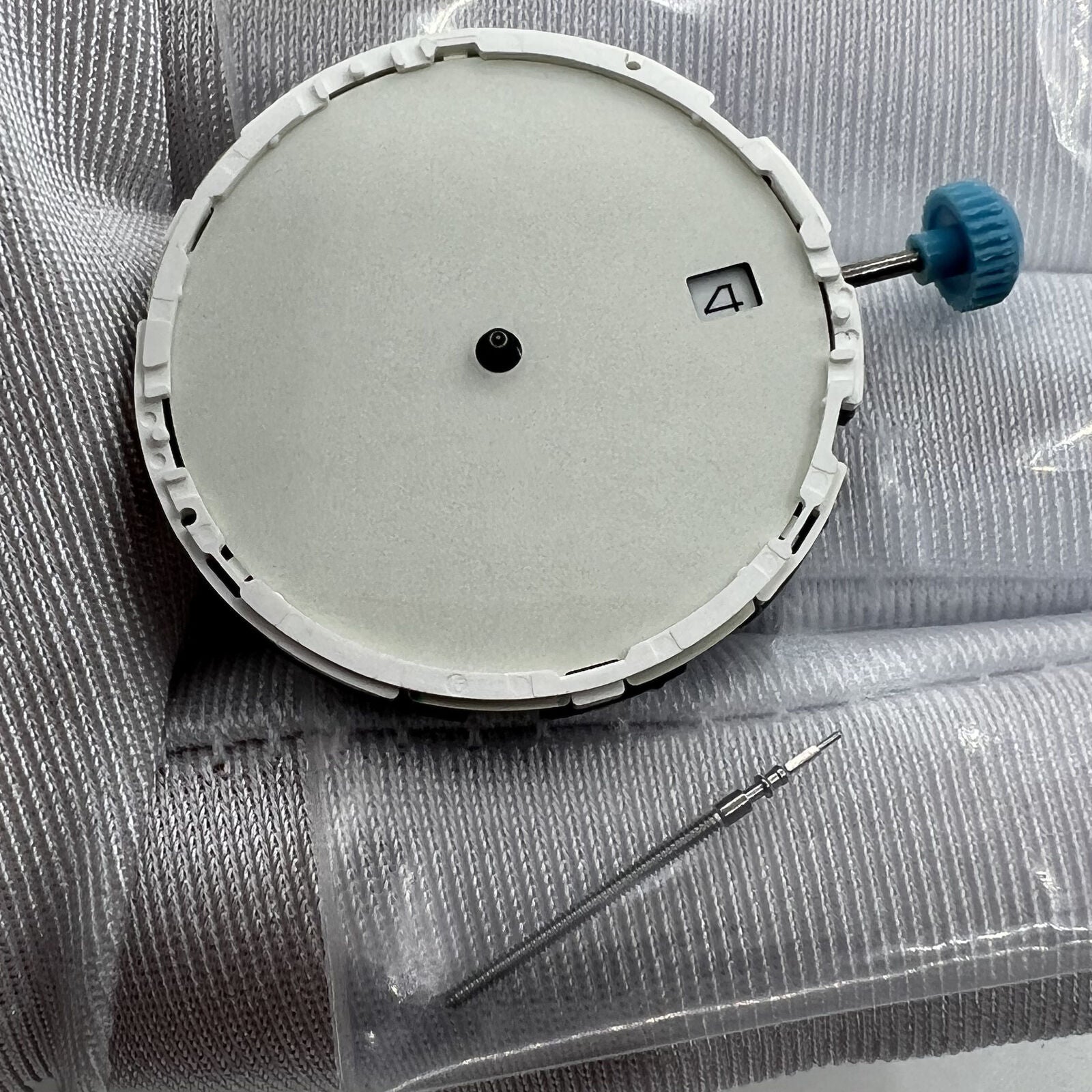 Miyota 6N10 quartz watch movement with luminescent hands and date, premium accessory for timepieces.