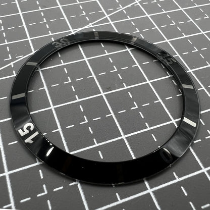 36mm black ceramic bezel insert with numerals, perfect for men and women?s watches.