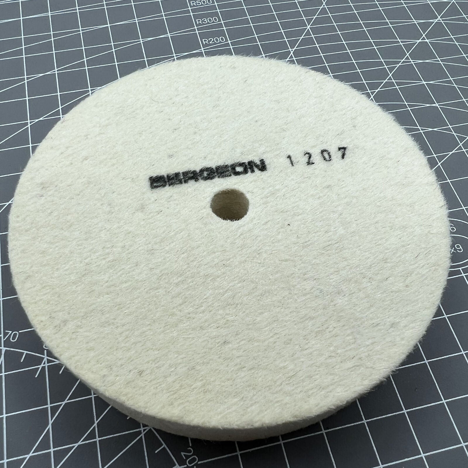 Swiss Bergeon 1207 white felt polishing wheel for watch accessories, precision Swiss craftsmanship for fine polishing tasks.