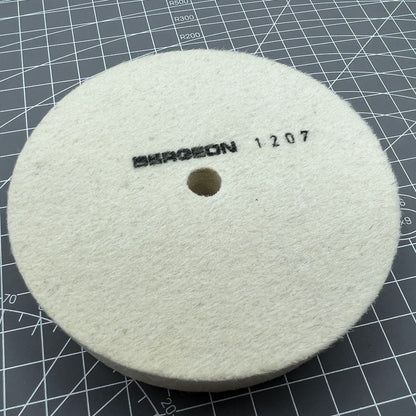Swiss Bergeon 1207 white felt polishing wheel for watch accessories, precision Swiss craftsmanship for fine polishing tasks.
