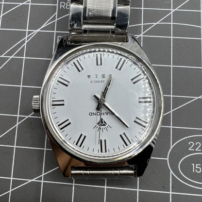 38mm Shanghai Diamond manual watch with white dial, silver case, 17 jewels for precise timekeeping.