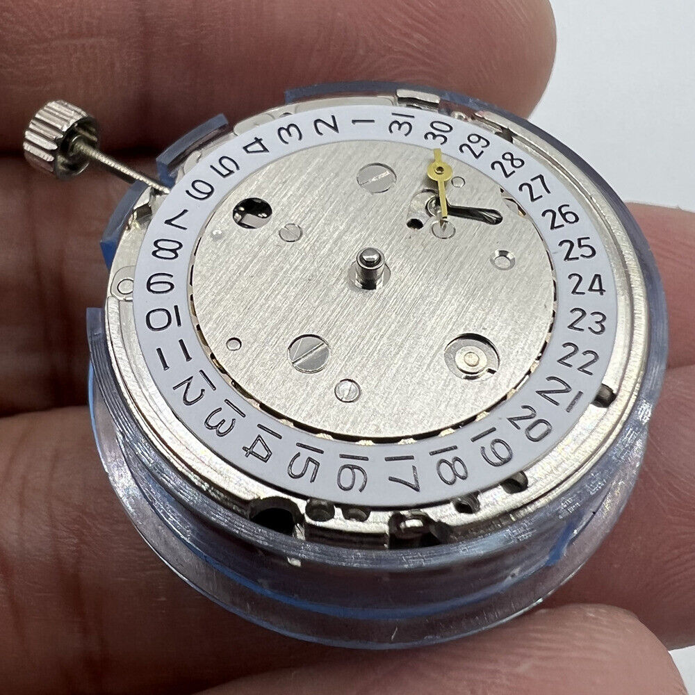 Asian Tianjin Seagull T17 watch with single calendar, automatic mechanical movement, sleek design in stainless steel.