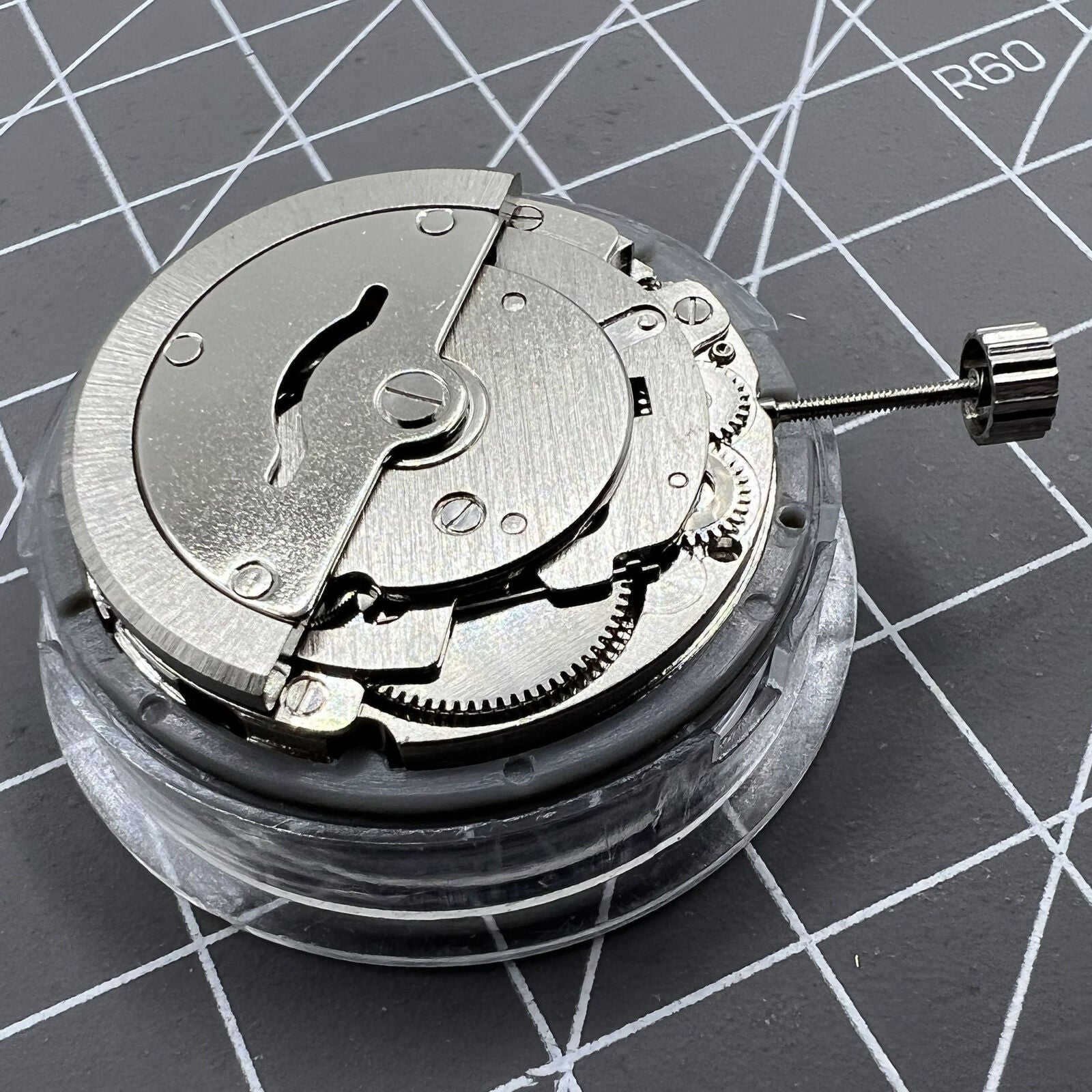 Tianjin Seagull T16 automatic watch with white dial, day-date display, and stainless steel case.