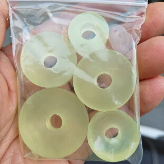 Set of 5 yellow watch movement cushions 2-3.5cm for precise watch repair and maintenance.