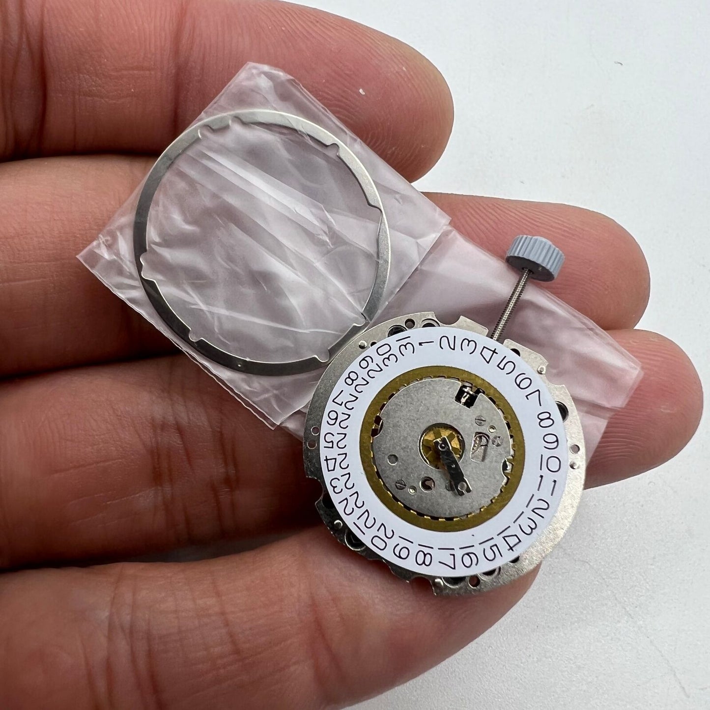 Ronda 705 three-hand quartz watch movement with date display at 3 o'clock, reliable precision part.