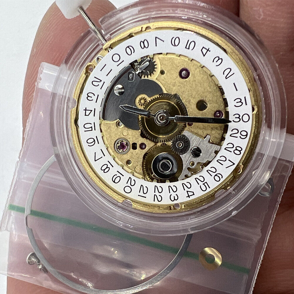 TIANJIN ST2130 golden mechanical watch movement with single calendar, for precise timekeeping and durability.