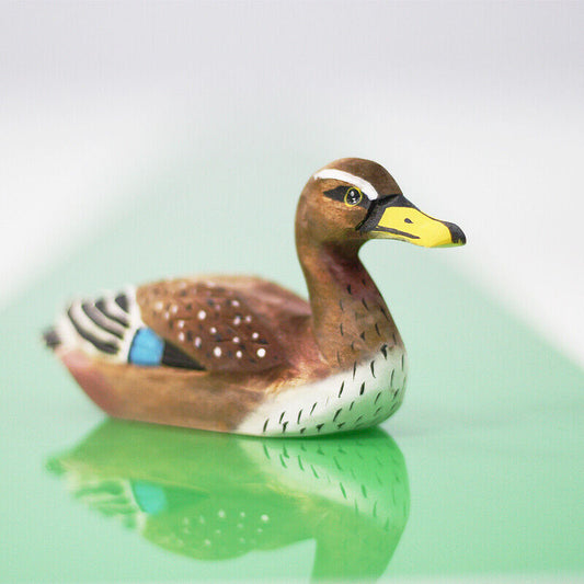 Handmade female Mallard wooden figurine, detailed decorative sculpture for home decor.