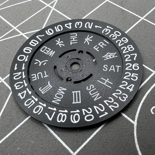 Blue Lume black date and week disk wheel for NH36 movement, enhancing watch accessory functionality.